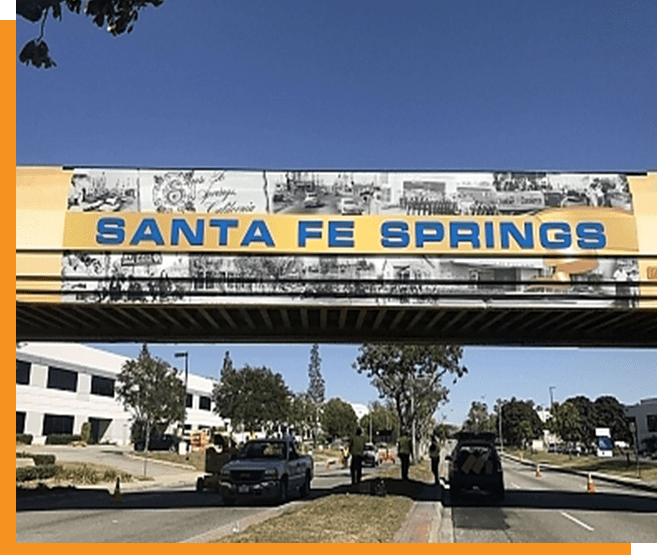 A bridge with the words santa fe springs on it.